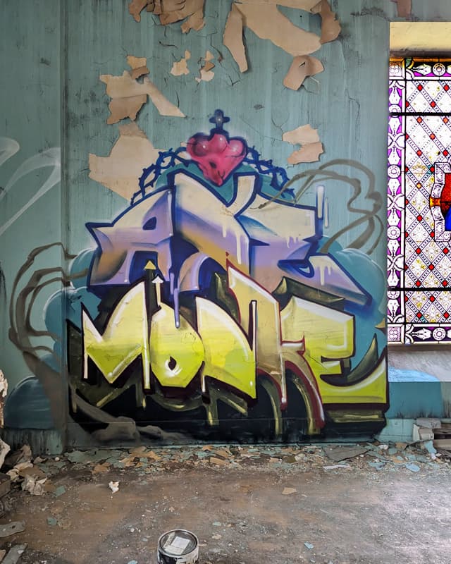 Axe and Monk.e in an abandoned church