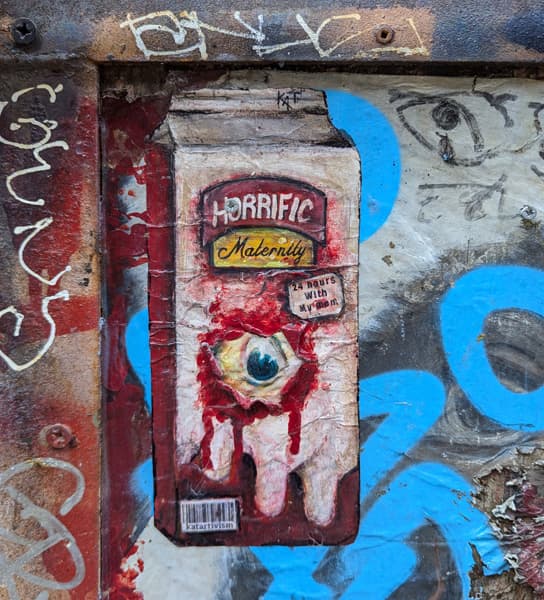 Kat paste-up off the 2025 edition of Mural Festival