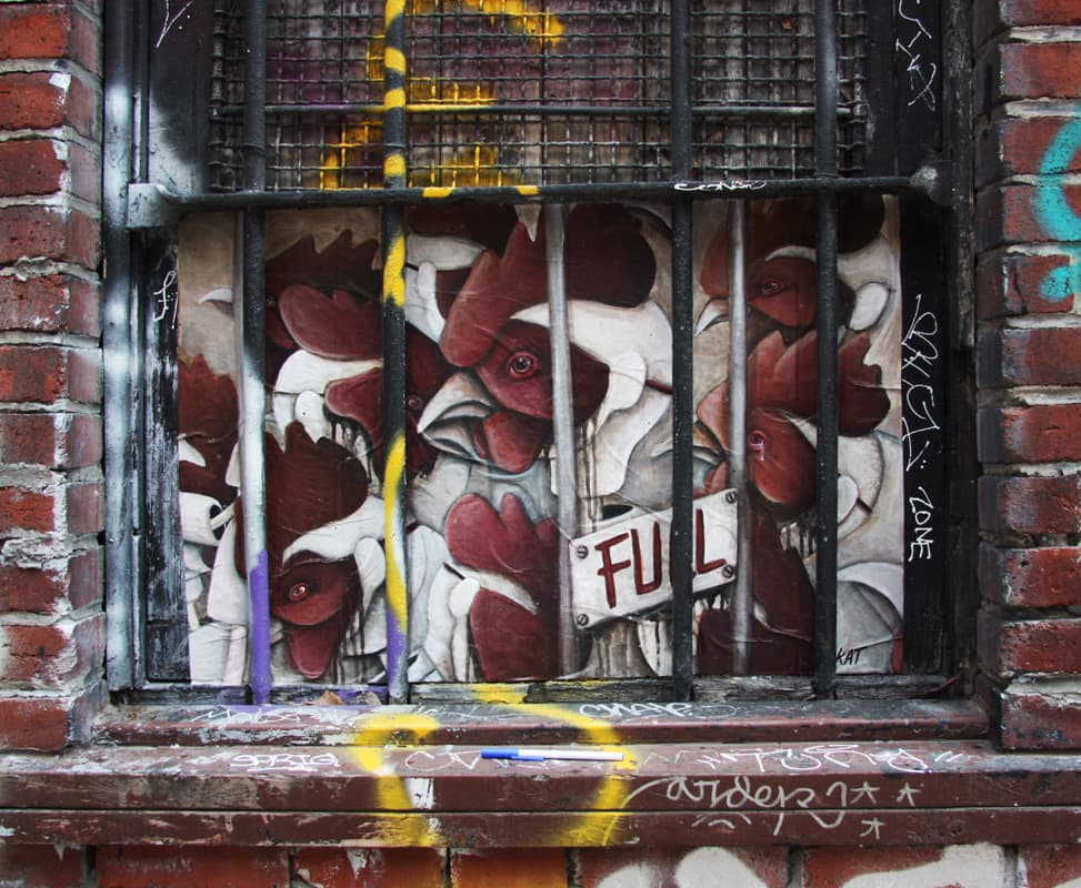 Kat wheatpaste in alley between St-Laurent and Clark