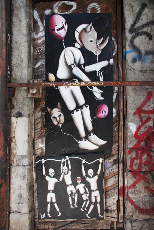 Kat wheatpaste in alley between St-Laurent and Clark