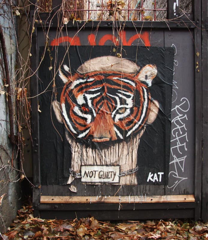 Kat wheatpaste in alley between St-Laurent and Clark