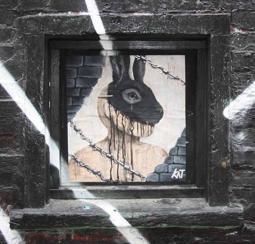 wheatpaste by Kat in alley between St-Laurent and Clark