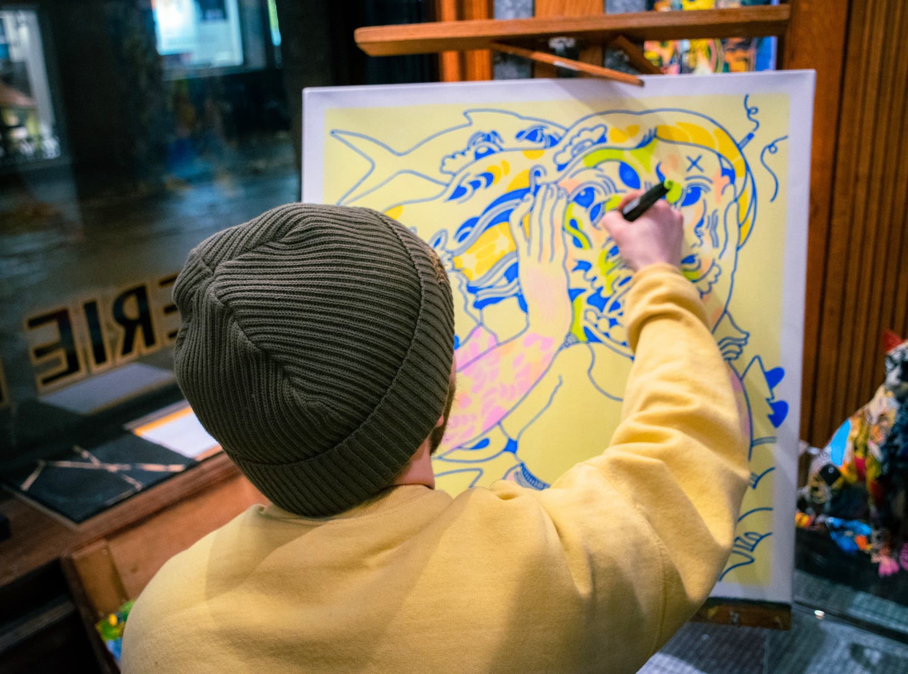 Artist working on a canvas