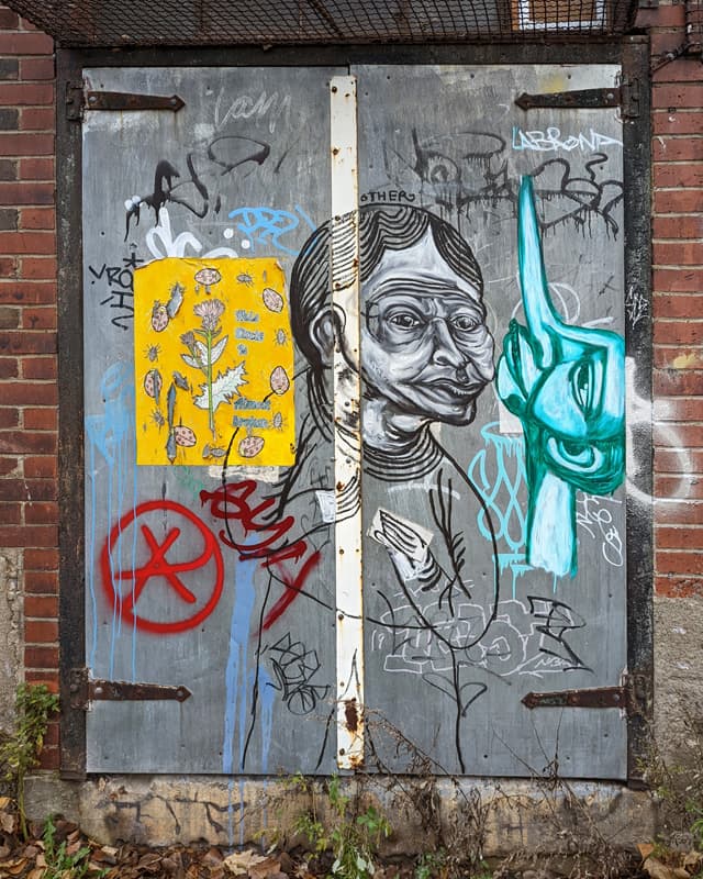 Other (middle), Labrona (right) and a poster by Cam (left), in Hochelaga