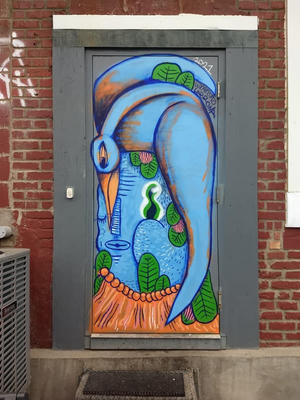 Waxhead and Labrona on a Mile End door