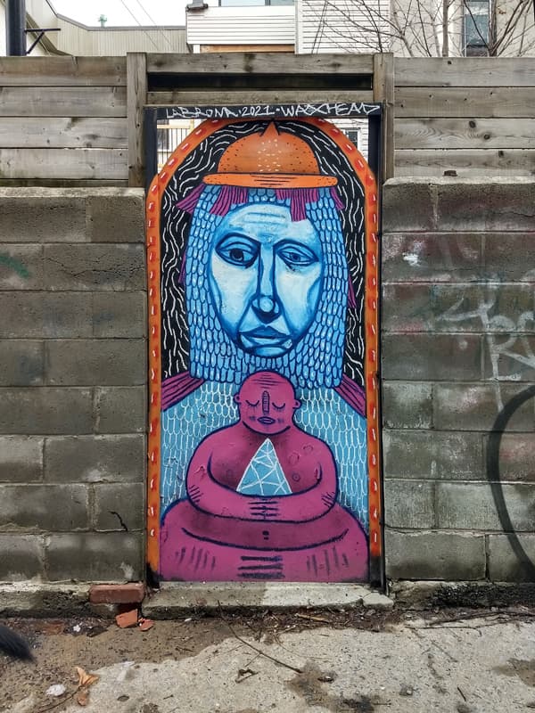 Waxhead and Labrona on a Mile End door