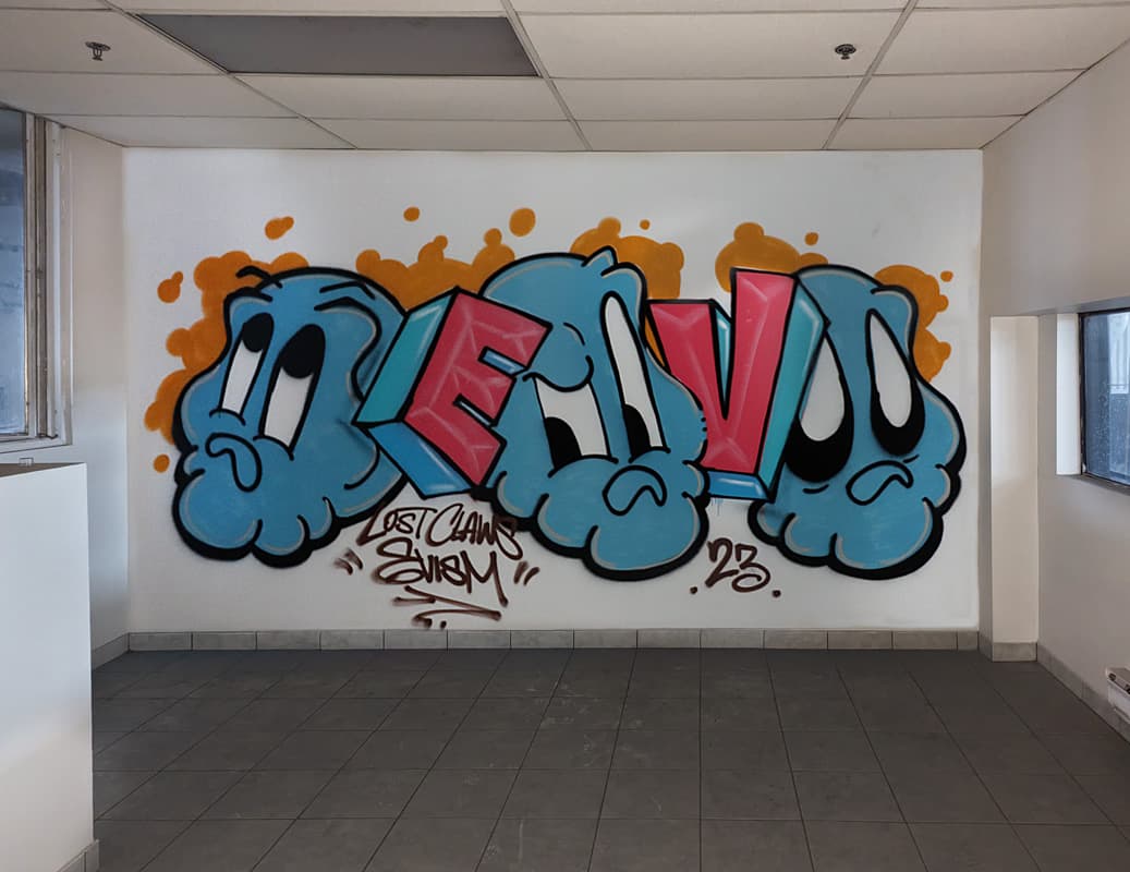 Lost Claws featuring letters by Evism, inside an abandoned warehouse