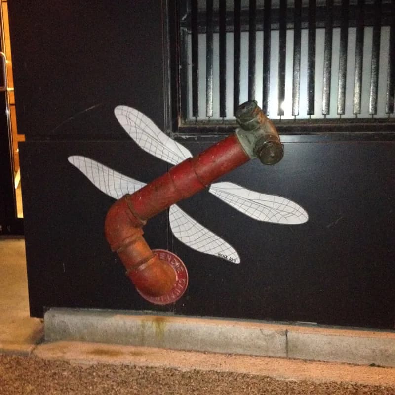 Dragonly wings wheatpaste by Makenoize; photo Makenoize
