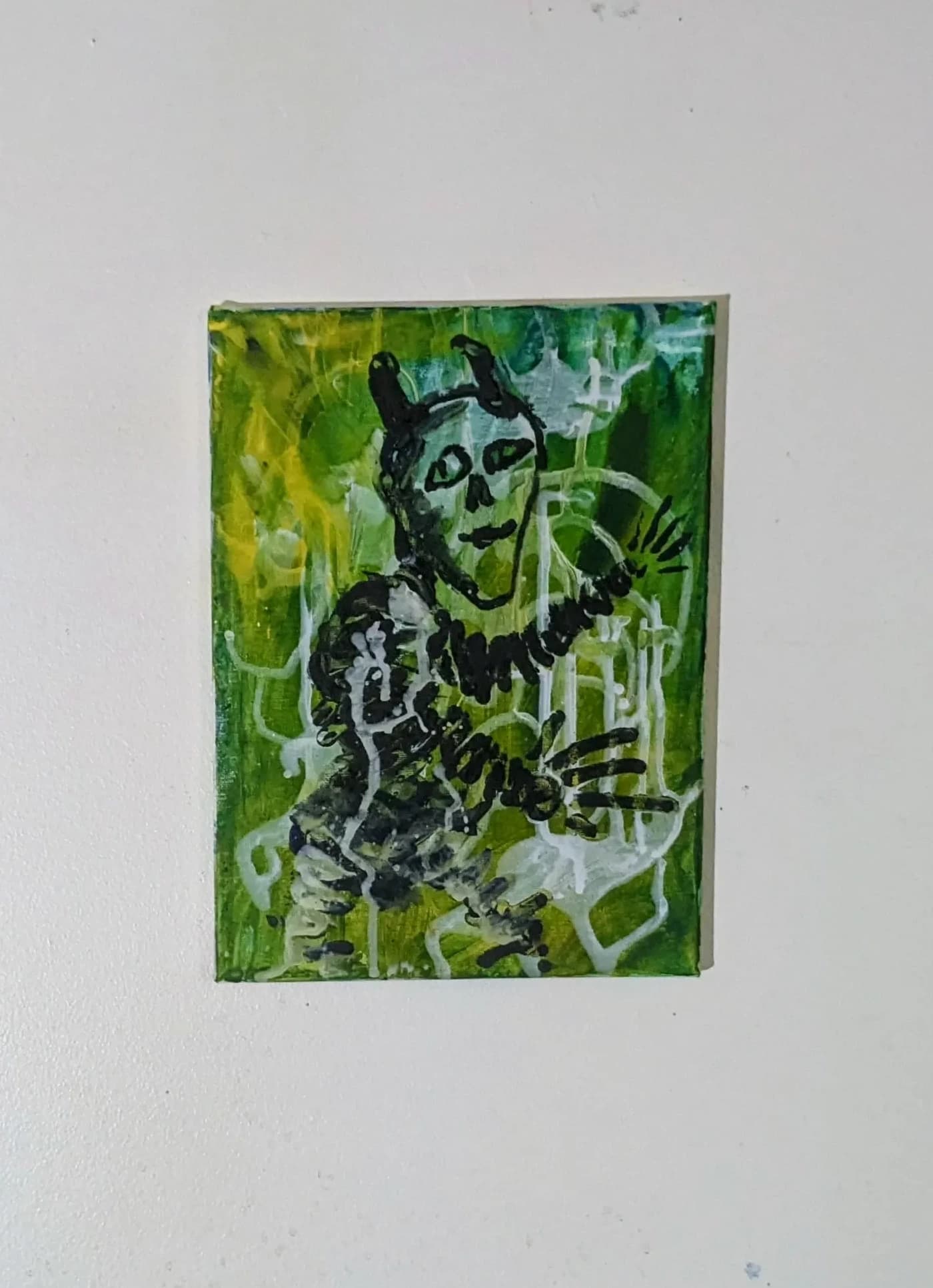 A green imp flees in fear