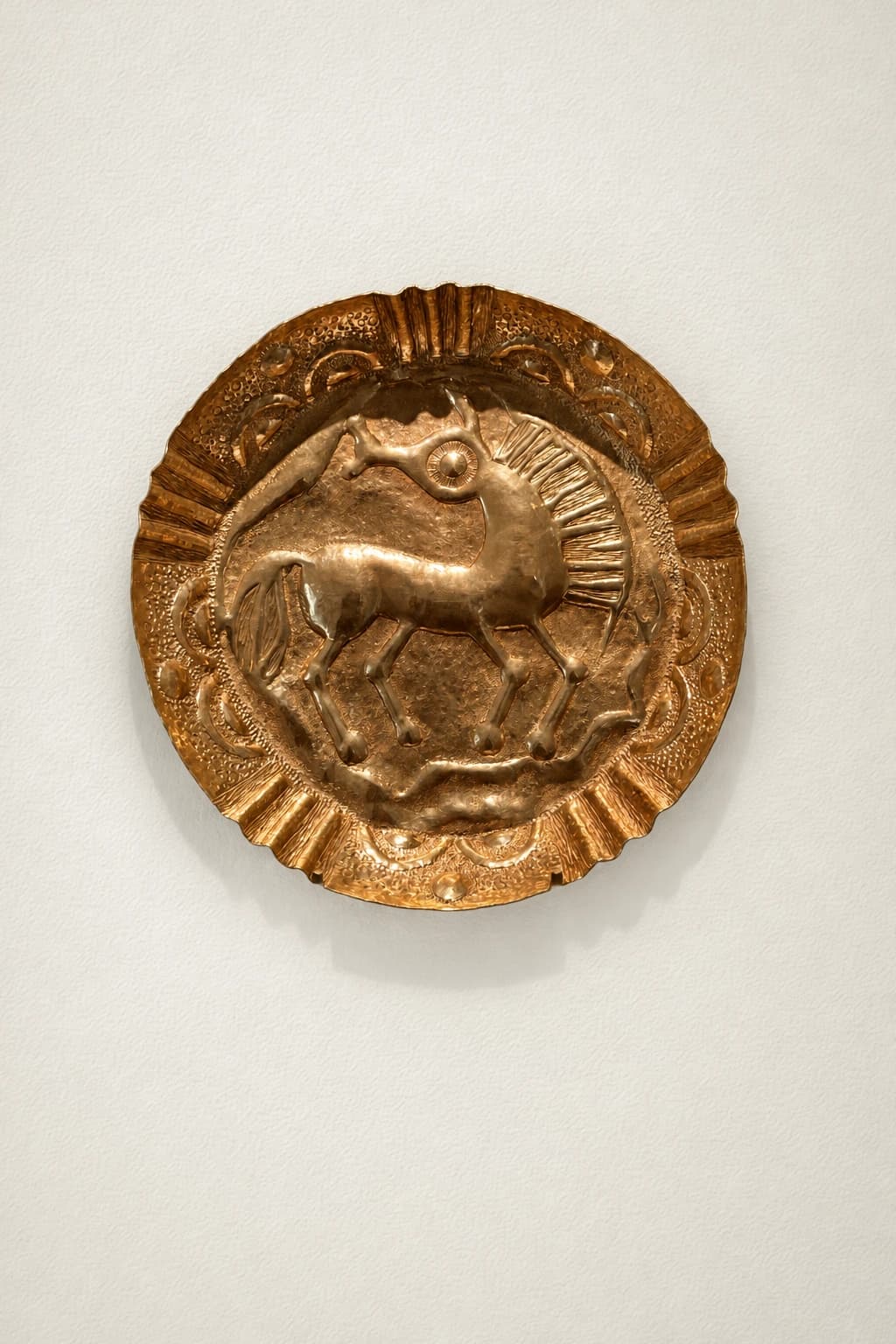 Disque en métal au cheval